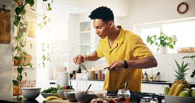 Buy stock photo Banana, cooking and smoothie with man in kitchen of home for hobby, meal prep or nutrition. Fruit, ingredients or recipe and person in apartment with blender for diet or health as culinary chef