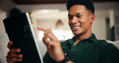 Buy stock photo Apartment, relax and happy man on tablet for ebook, research or news in home on couch or sofa. Smile, check or person browsing on touchscreen technology for social media, blogging or online story 