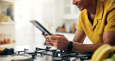 Buy stock photo Tablet, kitchen and hands of man with online for recipe with cooking healthy, wellness or diet dinner. Technology, research and person on app for supper preparation tutorial or instructions in home.