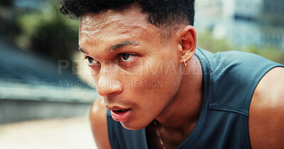 Buy stock photo Runner, man and tired with sweating at stadium for running fatigue, endurance challenge and race competition. Fitness, athlete and exhausted with breathing for exercise recovery, workout and resting