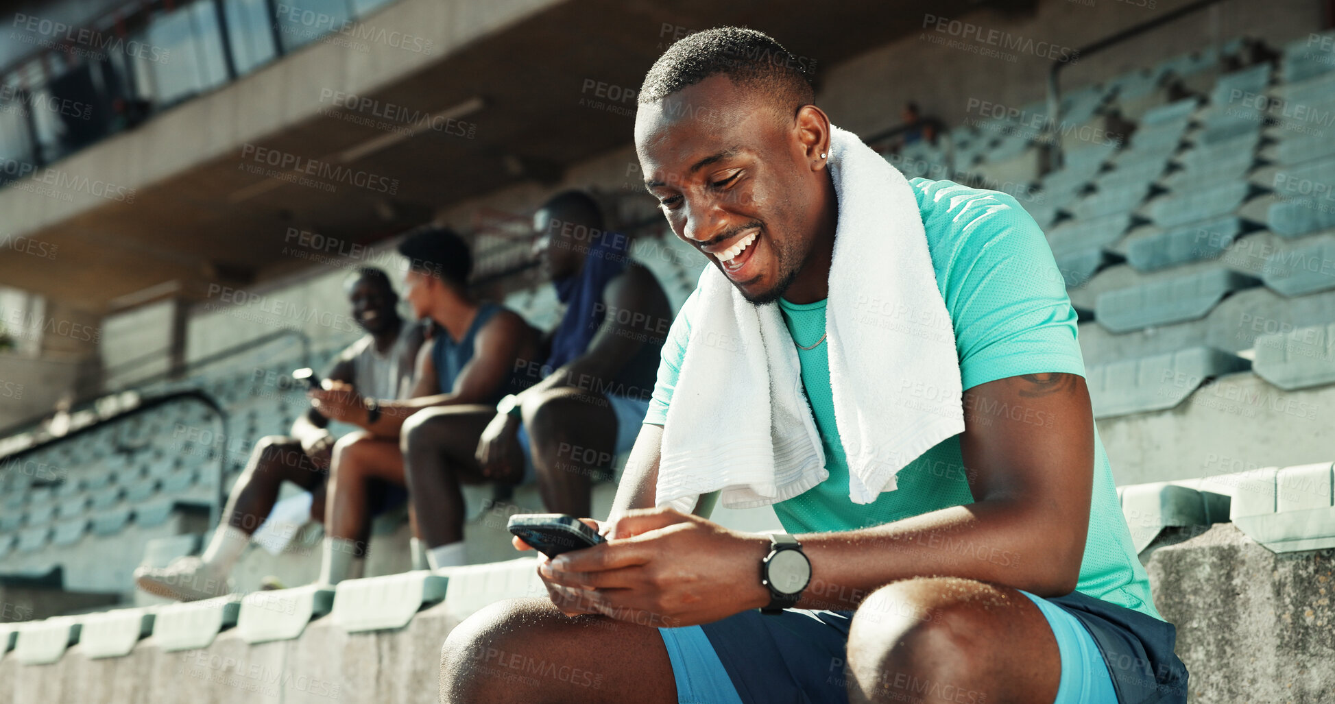 Buy stock photo Stadium, man and laughing with smartphone for fitness, online communication and meme on application. Outdoor, male person and typing with mobile for funny chat, social media and break for exercise
