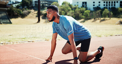 Buy stock photo Ready, training and athlete or man on running track for fitness, sports and cardio performance. Health, marathon and runner with person and outdoor stadium for competition, start and workout
