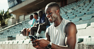 Buy stock photo Stadium, man and text with smartphone for fitness, online communication and scroll on application. Outdoor, male person and smile with mobile for chat message, social media and break for exercise