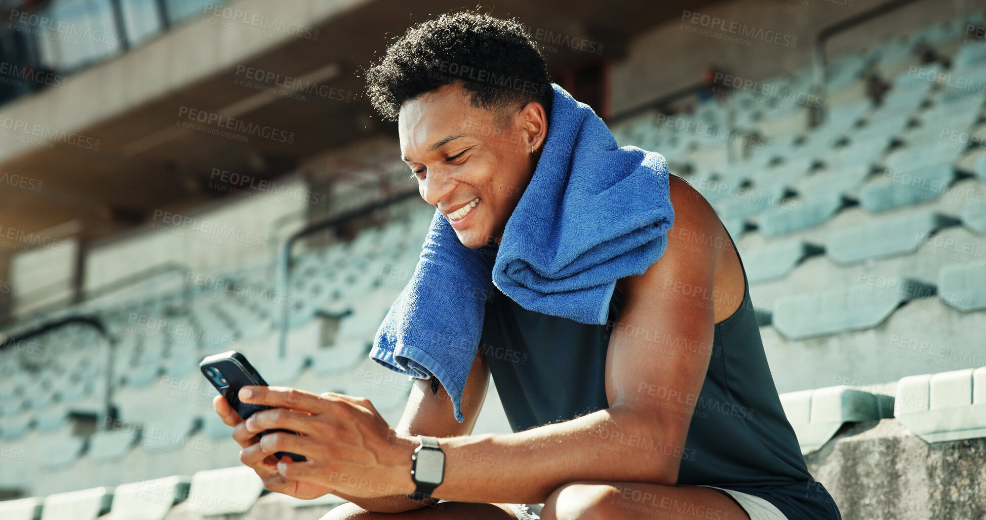 Buy stock photo Stadium, man and message with smartphone for fitness, online communication and scroll on application. Outdoor, male person and smile with mobile for typing chat, social media and break for exercise