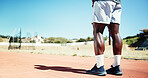Legs, athlete and man for fitness at stadium for training, exercise and marathon practice on track field. Male runner, starting line and endurance for sports event, cardio performance and preparation