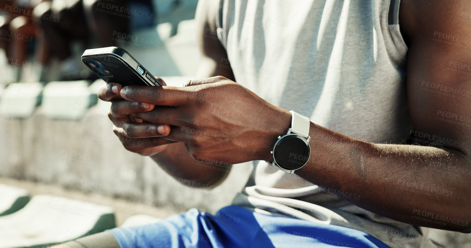 Buy stock photo Athlete, hands and typing with phone and man in stadium for running performance, fitness stats and training plan. Closeup, workout metrics and exercise schedule with person for competition results