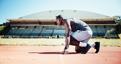 Buy stock photo Ready, fitness and athlete or black man on running track for sports, training and cardio performance. Health, marathon and runner with person and outdoor stadium for competition, start and workout