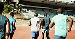 Back, people and running for race on track for exercise, training and competition for marathon. Athlete, men and runner with speed for fitness event, performance and sports challenge for tournament