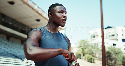 Buy stock photo Thinking, black man and water bottle at stadium for fitness, planning and ideas for sports training. Athlete, male runner and thoughts with beverage for exercise, workout and performance for marathon