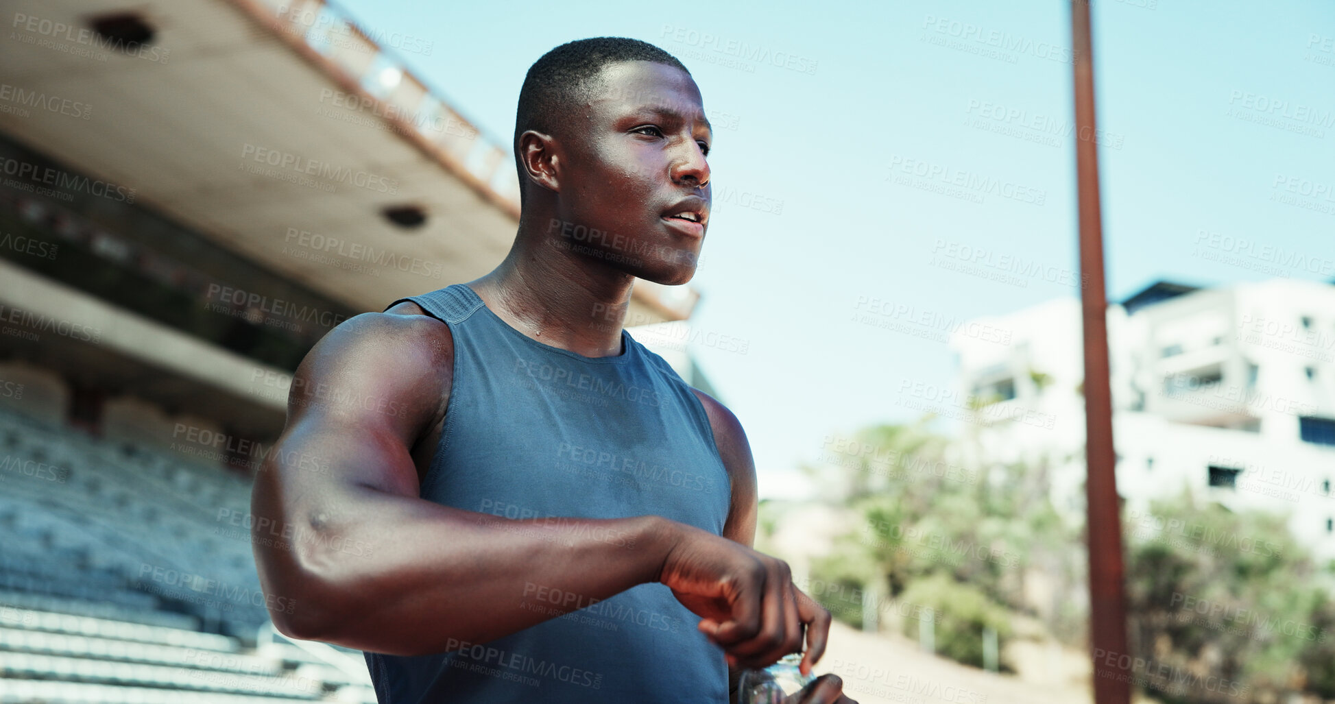 Buy stock photo Thinking, black man and water bottle at stadium for fitness, planning and ideas for sports training. Athlete, male runner and thoughts with beverage for exercise, workout and performance for marathon