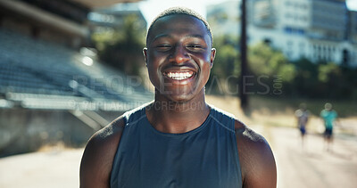Buy stock photo Portrait, athlete and black man with smile at stadium for exercise, sports training and practice on field. Male runner, happy and confidence for fitness, workout and endurance for marathon challenge