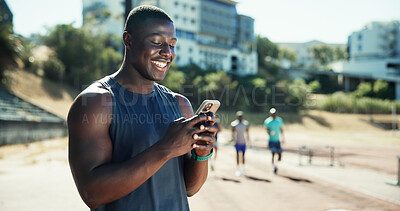 Buy stock photo Outdoor, man and chat with smartphone for fitness, online communication and smile on application. Stadium, male person and athlete with mobile for typing message, social media and break for exercise