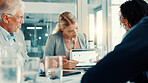 Discussion, business woman and tablet screen with graph in meeting, investment stats and planning. Office, team and brainstorming with technology for financial data, analysis and sales presentation