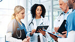Medical, report or tablet with doctors and nurses in hospital together for discussion or feedback. Conversation, healthcare and insurance with professional medicine team in clinic for collaboration