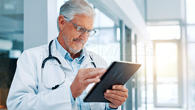 Buy stock photo Happy, doctor or man with tablet, typing and research with email for shift schedule. Internet, mature person or medical with professional, healthcare or online reading for diagnosis or website info