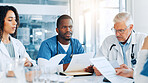 Man, doctors and meeting with documents at hospital, review and planning with report for virus. People, medical staff and teamwork with feedback, results and talk for solution in boardroom at clinic