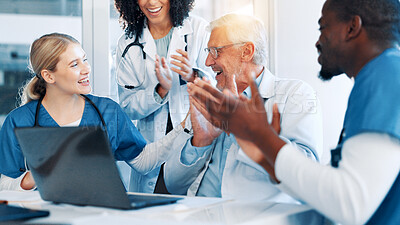Buy stock photo Doctors, man and team with applause, laptop and support with goals, results and celebration. People, group and women with staff for success, praise or achievement in career with cheers at hospital