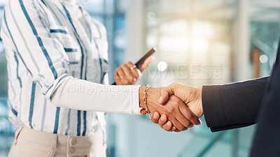 Buy stock photo Shaking hands, partnership and business people in office with deal, negotiation or contract. Collaboration, closeup and financial manager with client for agreement, welcome or thank you handshake.