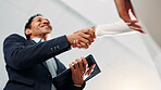 Shaking hands, negotiation and business people in office with deal, partnership or contract. Collaboration, low angle and financial manager with client for agreement, welcome or thank you handshake.