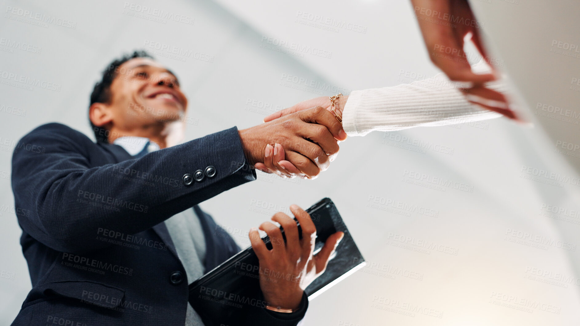 Buy stock photo Shaking hands, negotiation and business people in office with deal, partnership or contract. Collaboration, low angle and financial manager with client for agreement, welcome or thank you handshake.