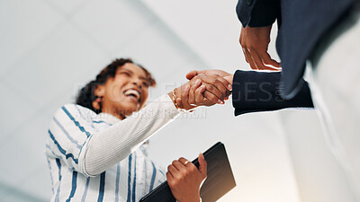 Buy stock photo Shaking hands, agreement and business people in office with deal, negotiation or contract. Collaboration, low angle and financial manager with client for partnership, welcome or thank you handshake.