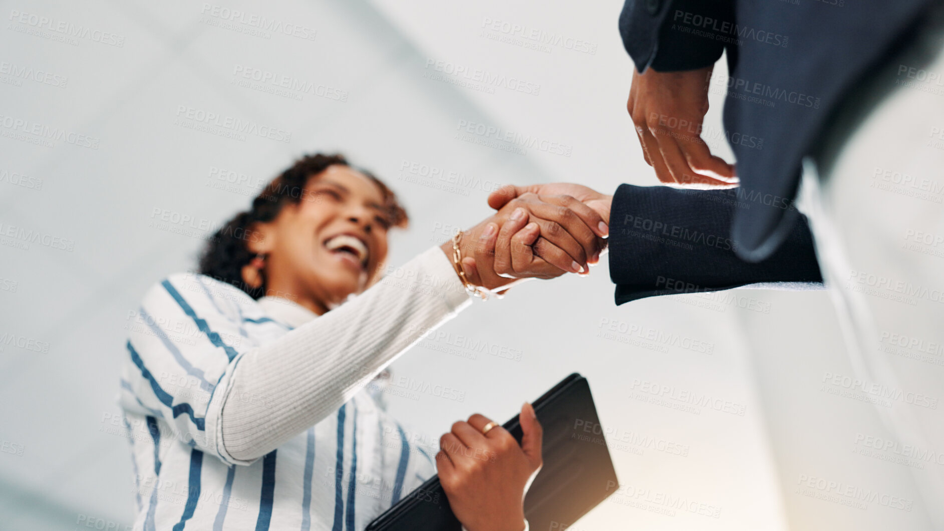 Buy stock photo Shaking hands, agreement and business people in office with deal, negotiation or contract. Collaboration, low angle and financial manager with client for partnership, welcome or thank you handshake.