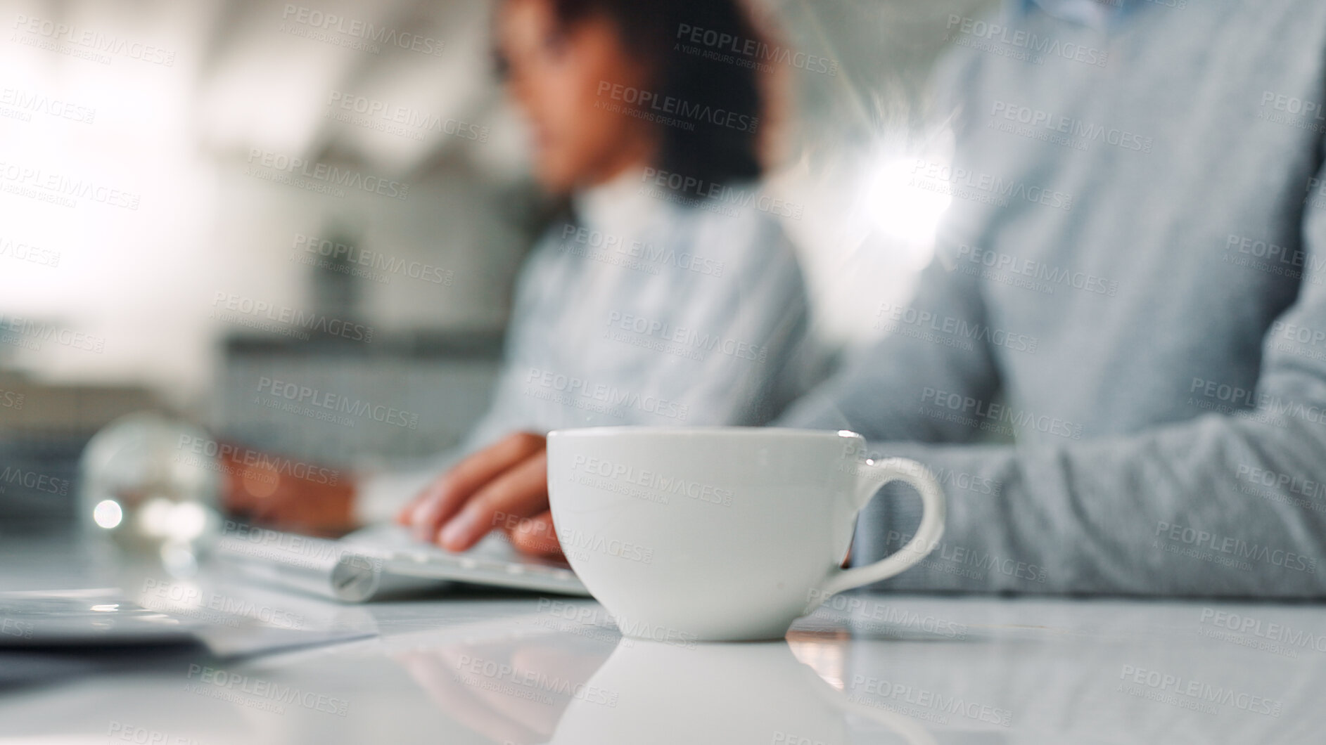 Buy stock photo Hands, mug or closeup of coffee in office with caffeine, cappuccino or espresso in morning. Business, drink or person typing on keyboard with latte, beverage or tea for energy in company workplace