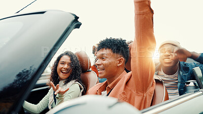 Buy stock photo Celebration, drive and road trip with happy friends in car together for holiday, travel or vacation. Arm raised, energy and success with group of people riding in convertible vehicle for getaway