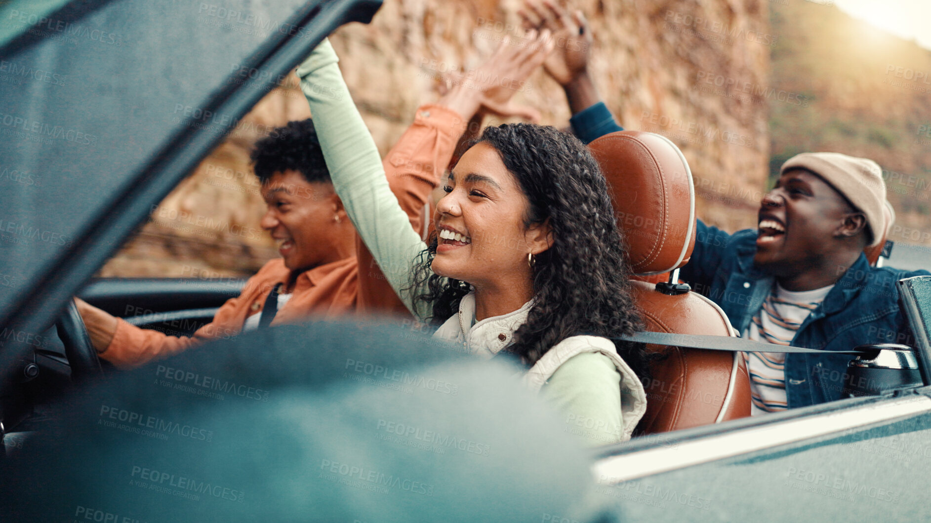 Buy stock photo Drive, energy and road trip with happy friends in car together for holiday, travel or vacation. Dance, eExcited and freedom with group of people riding in convertible vehicle for weekend getaway