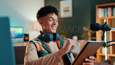 Buy stock photo Man, streamer and tablet in home with smile, mic and typing with script editing for video production. Gen z influencer, happy and app for chat, click and subscription list on social media at house