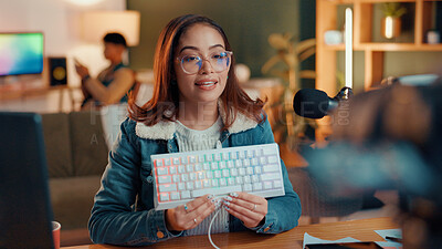 Buy stock photo Broadcast, microphone and woman review keyboard for build quality, opinion or design on social media. Camera, content creator and show tech for live stream, podcast and gaming gear with RGB at home