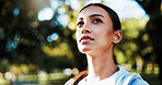 Fitness, thinking and woman in nature on break for relax, health or wellness with inspiration. Person, thoughts and sports athlete at park with reflection, daydream or vision with ideas for exercise