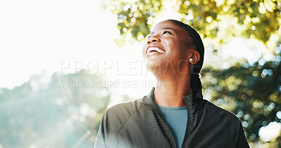 Buy stock photo Thinking, hiking and happy black woman with nature, smile and wellness for hobby, explore and travel. Space, hiker and person with woods, vacation activity and sightseeing for environment and break