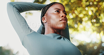 Buy stock photo Fitness, exercise and black woman with stretching at park to start workout, cardio performance and getting ready. Low angle, athlete and arm warm up in nature for training and muscle tension relief