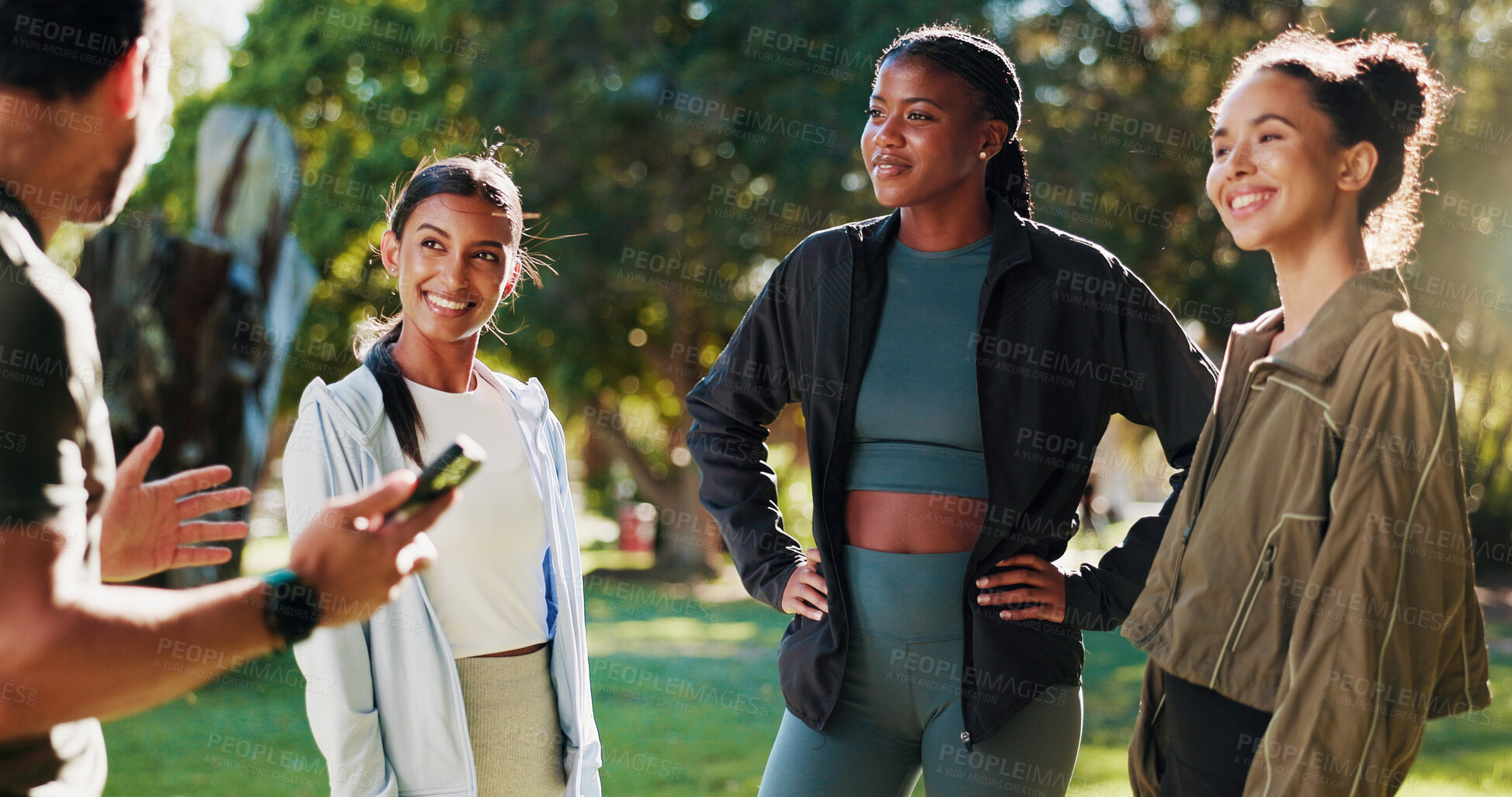 Buy stock photo Group, outdoor and people with fitness, smartphone and smile with challenge, feedback and exercise. Healthy athlete, man and women in park, cellphone and conversation for goals, training and wellness