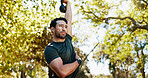 Fitness, park and man exercise with kettlebell for tricep overhead extension workout, health or wellness. Bodybuilder, strength training and weightlifting outdoor for muscle growth, power and strong