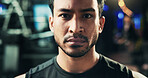 Portrait, serious and man in gym, fitness and training with workout, commitment and exercise. Face, bodybuilder or healthy person in wellness center, challenge or routine with sports or muscle growth