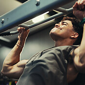 Fitness, man and exercise on pull up bar at gym for shoulder muscle ...