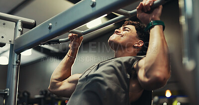Buy stock photo Fitness, man and exercise on pull up bar at gym for shoulder muscle, bicep strength or bodybuilding performance. Bodybuilder, energy and power training at sports club for intense workout or endurance