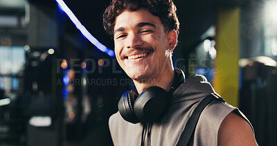 Buy stock photo Man, portrait and headphones at gym with smile, confident and ready for routine at exercise center. Person, happy and bodybuilder with pride for workout, training and fitness at club in Portugal