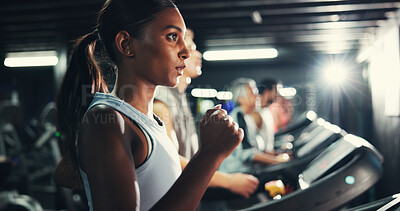 Buy stock photo Workout, woman and running on treadmill in gym at night for fitness training, endurance challenge and calorie burning. Breathe, late exercise and girl with energy for intense cardio and race practice