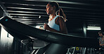 Runner, gym and health with woman on treadmill for training, exercise and cardio performance. Wellness, fitness and workout challenge with person on running machine for sports, athlete and low angle