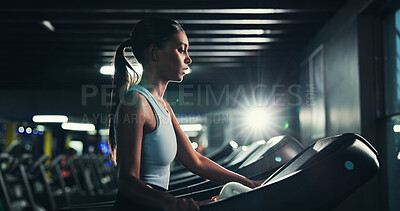Buy stock photo Fitness, profile and treadmill with woman in gym for cardio training or performance routine. Exercise, intense and running with Indian athlete in dark health club for break, challenge or workout