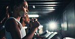 Fitness, girl and running on treadmill in gym at night for agility training, speed challenge and sports practice. Flare, evening workout or runner on machine for cardio exercise or muscle performance