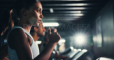 Buy stock photo Fitness, girl and running on treadmill in gym at night for agility training, speed challenge and sports practice. Flare, evening workout or runner on machine for cardio exercise or muscle performance