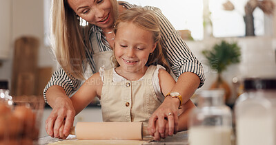 Baking, woman or child with rolling pin in house, learn and help for mom with dough and culinary skills. Cooking, mother or daughter with flour for meal prep, growth and development of kid in kitchen
