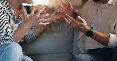 Buy stock photo Home, hands and couple with conflict in marriage, toxic relationship and disagreement for divorce. Frustrated, man and woman with fighting for separation, breakup and communication problem in lounge