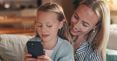 Buy stock photo Home, mother and girl with smartphone, smile and bonding together with online entertainment. Happy family, cellphone and parent on sofa, mama or daughter with tech, internet or help with social media