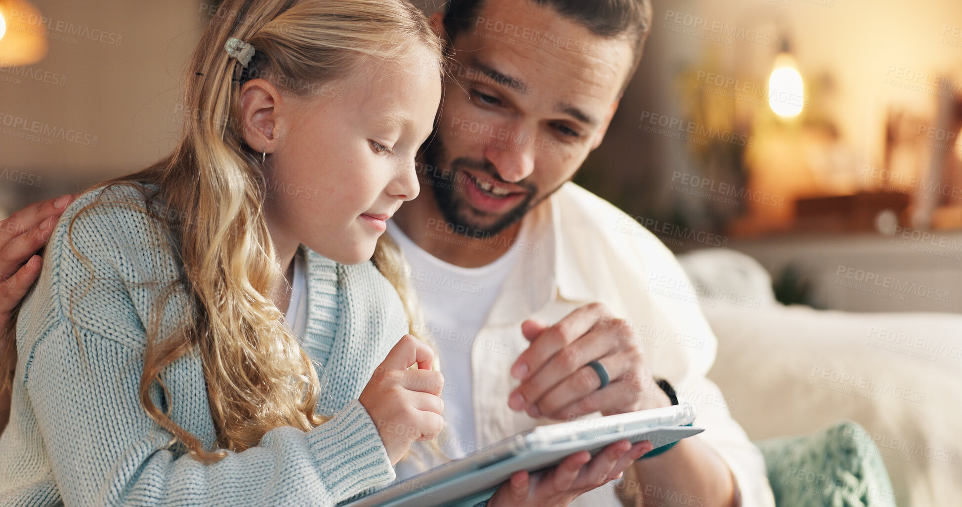 Buy stock photo Home, father and girl with tablet, smile and bonding together with online entertainment. Happy family, apartment and parent on sofa, dad and daughter with tech, internet and help with cartoon and app