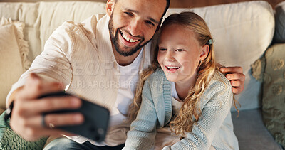 Buy stock photo Father, girl and hug with selfie on sofa, above or happy with care, love and bonding in family home. Dad, child and people with photography, profile picture and embrace for memory in lounge at house